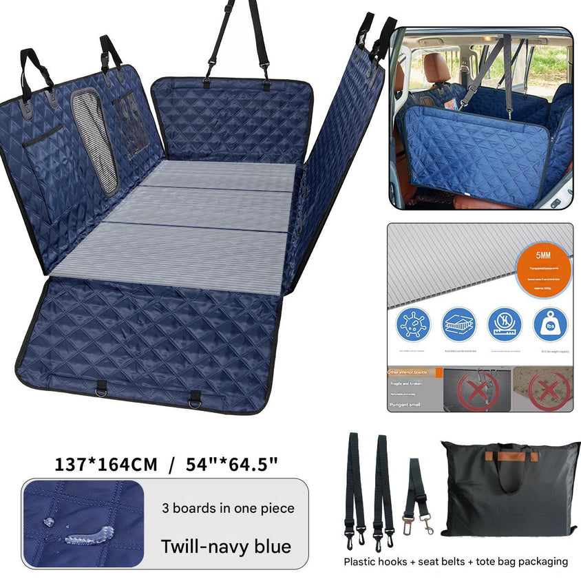 Navy blue car seat cover with straps and additional accessories on a white background